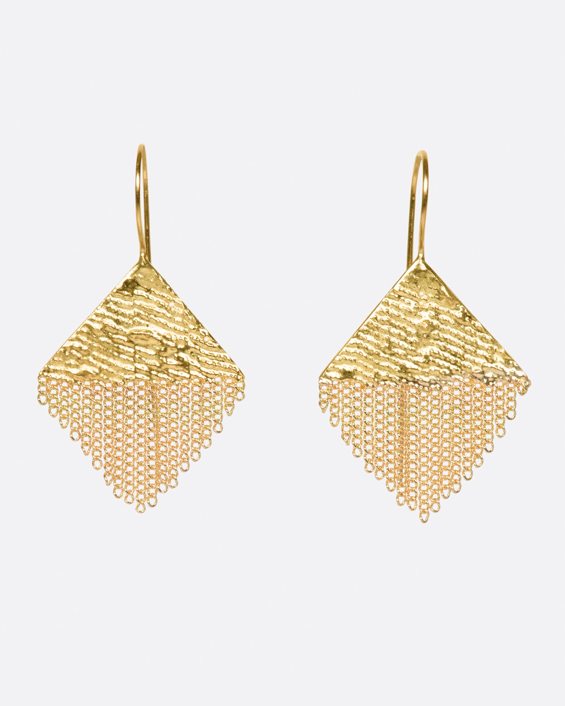 A pair of diamond-shaped gold earrings made from gold chain and solder.