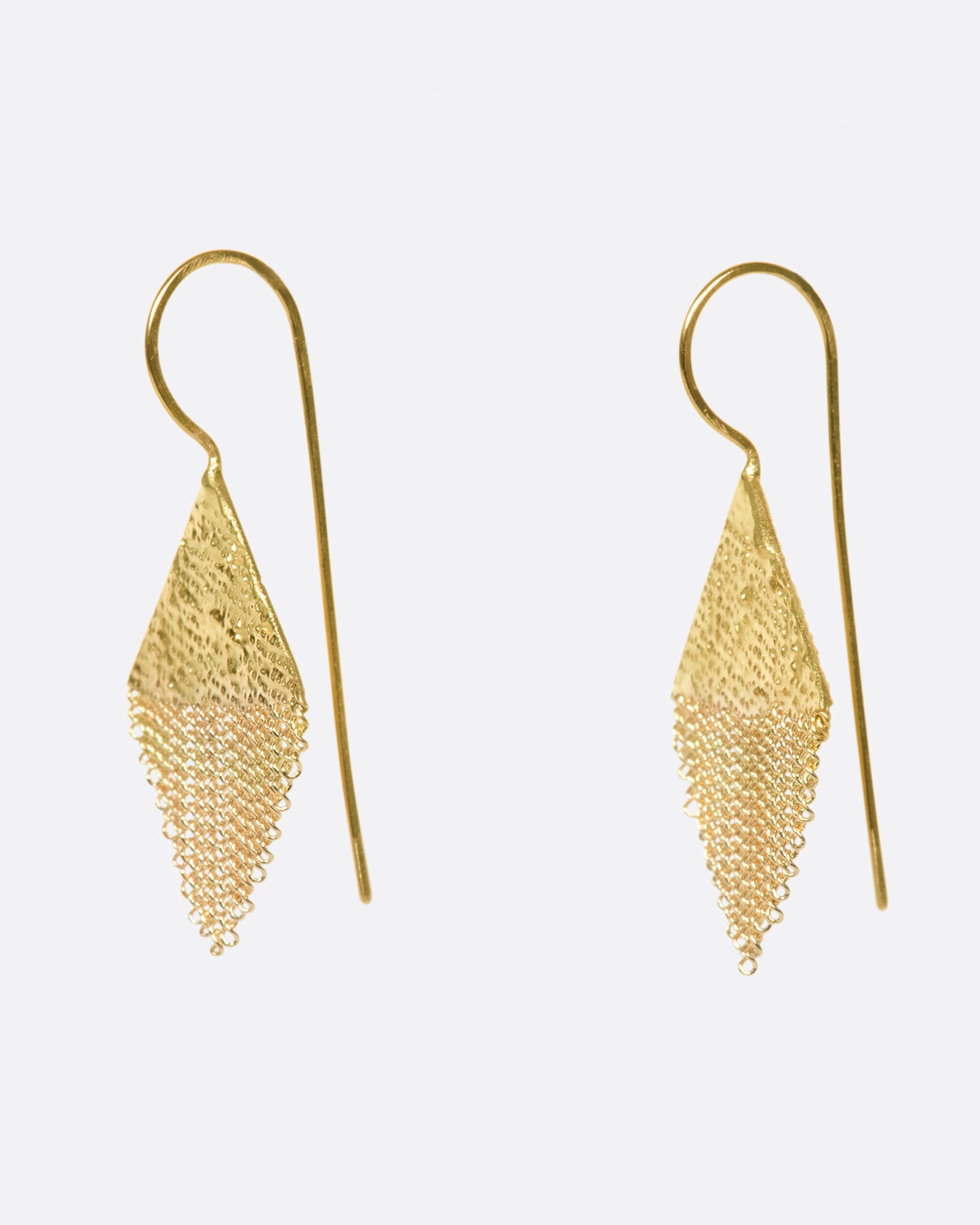 A pair of diamond-shaped gold earrings made from gold chain and solder.