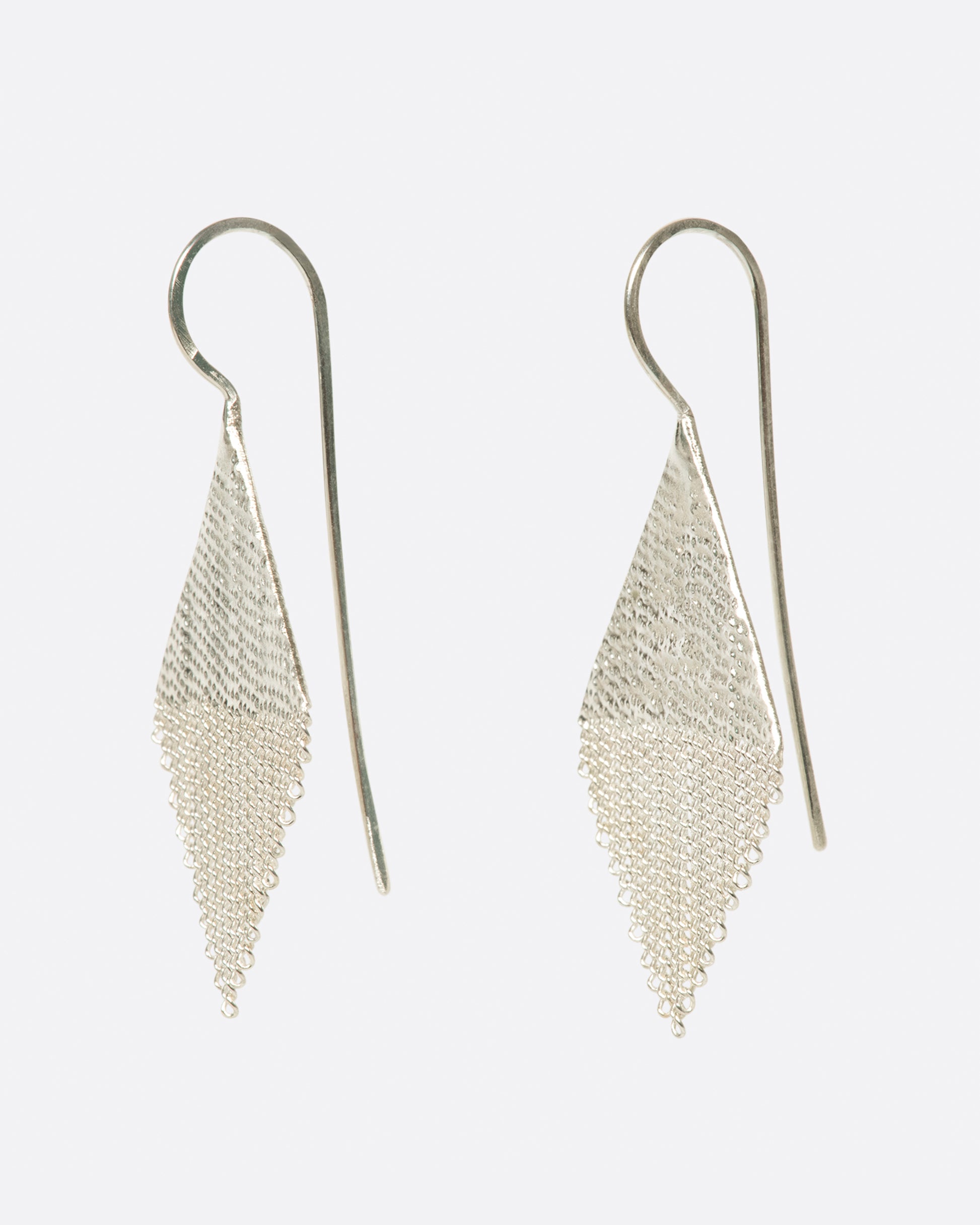 A pair of diamond shaped drop earrings made from sterling silver chains and silver solder.