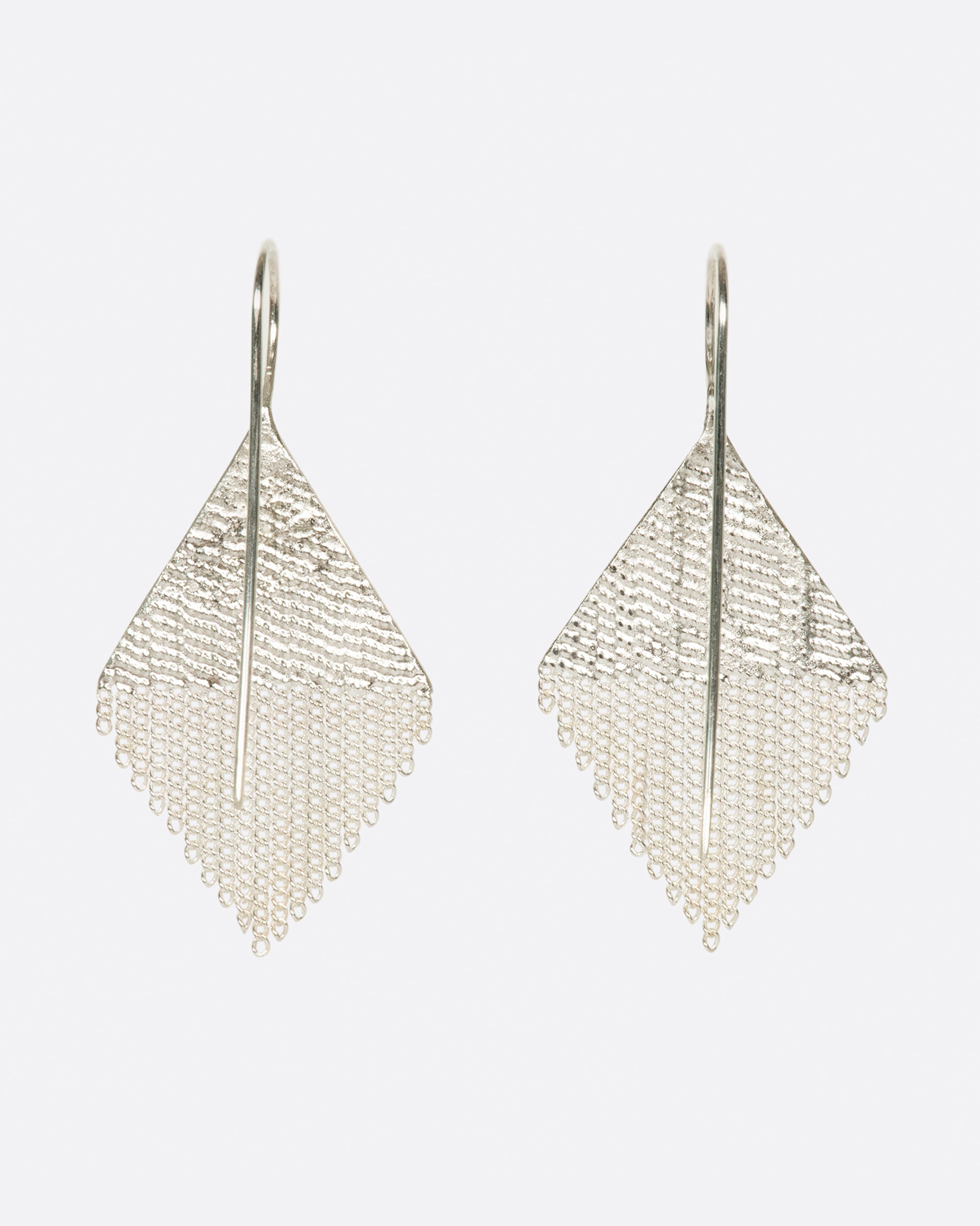 A pair of diamond shaped drop earrings made from sterling silver chains and silver solder.