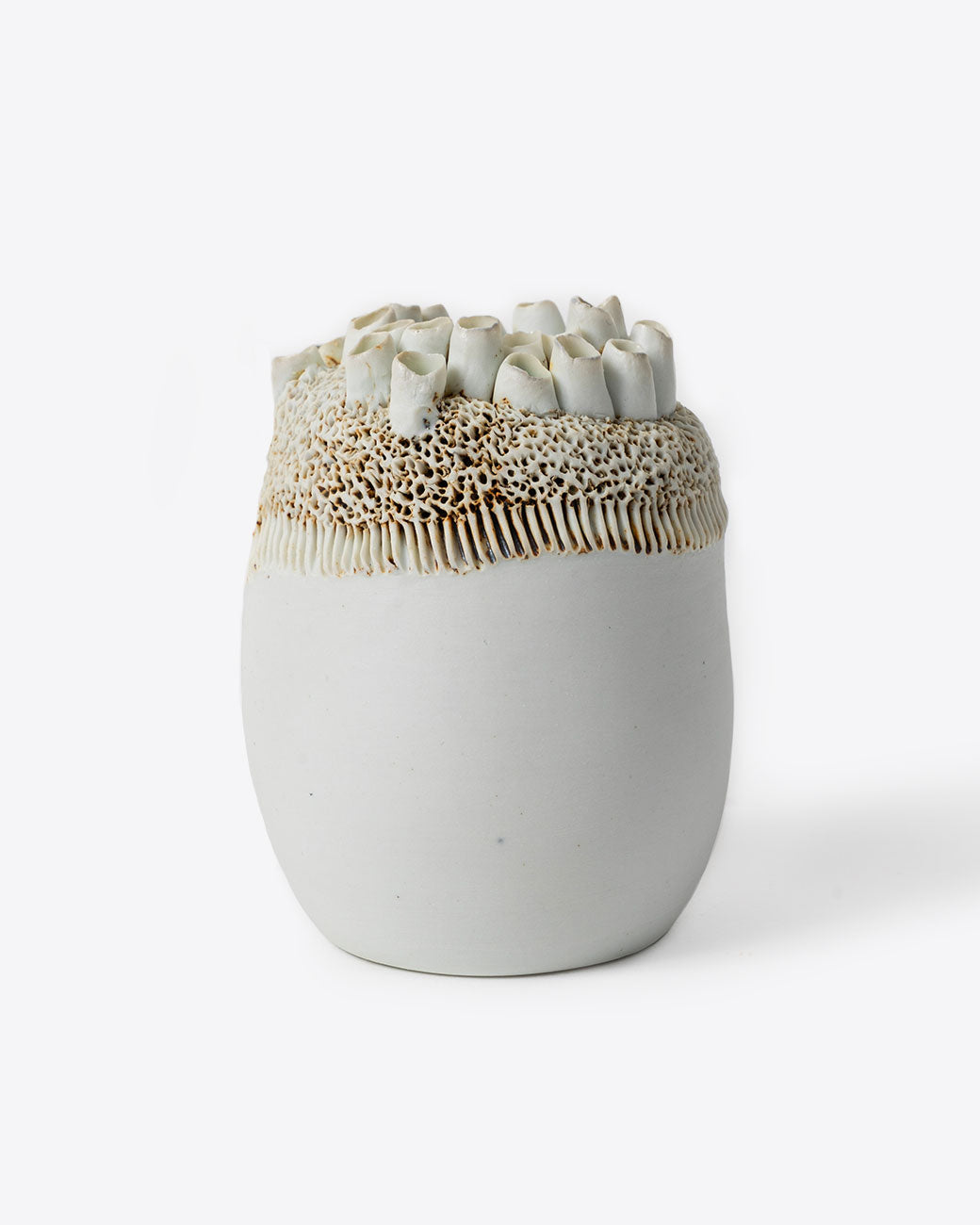 Handmade porcelain barnacle motif vase by Jo Boyer.