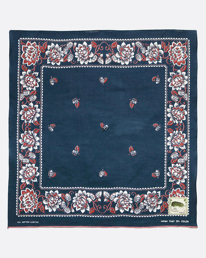Kapital rockwell flower bandana in navy blue, shown laying flat.