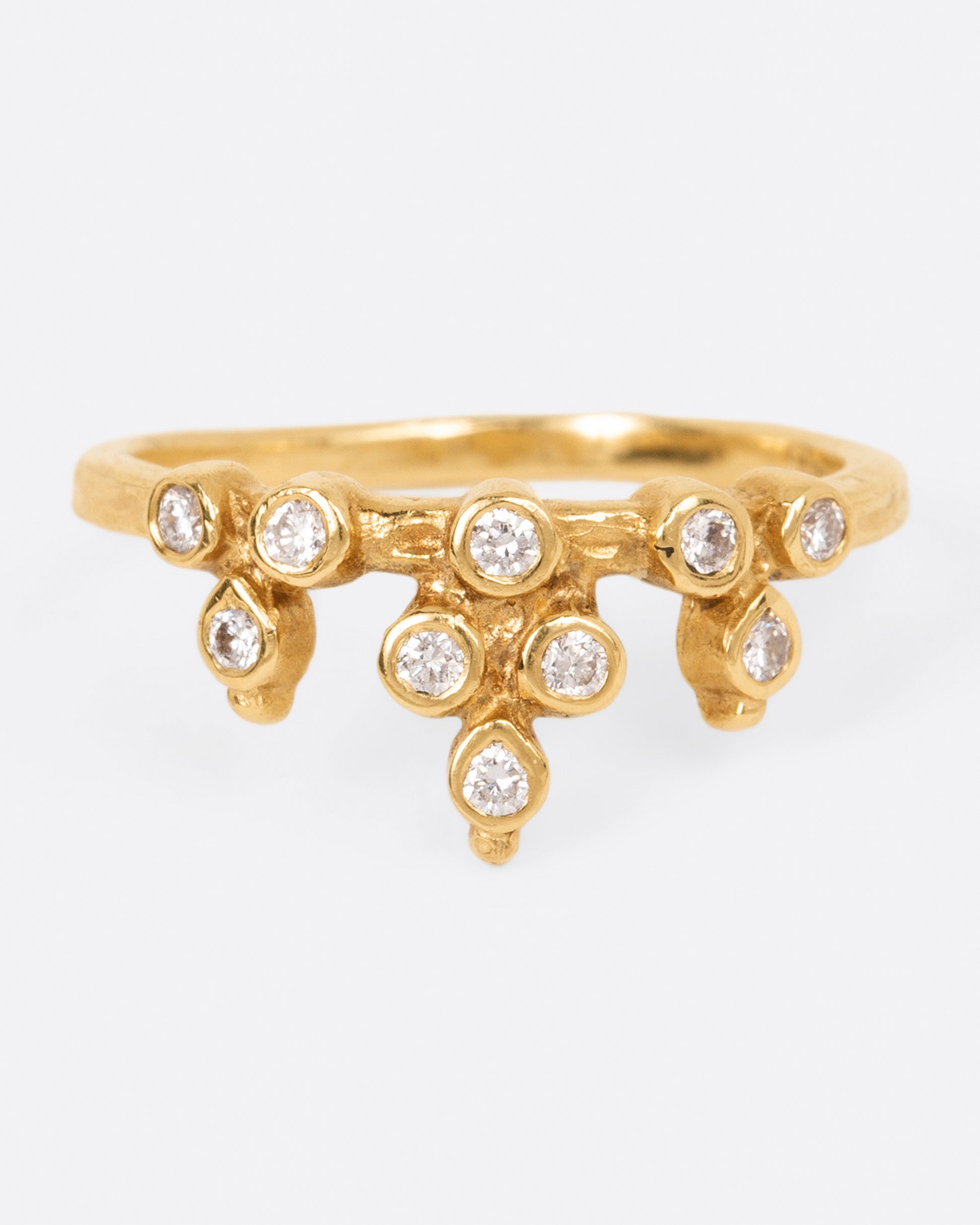 A yellow gold crown ring with round white diamonds, shown from the front.