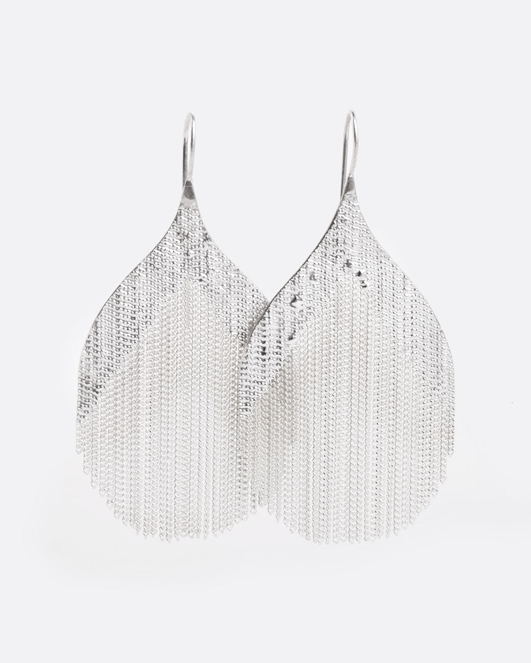 whale tail shaped earrings with a number of dangling chains in the middle