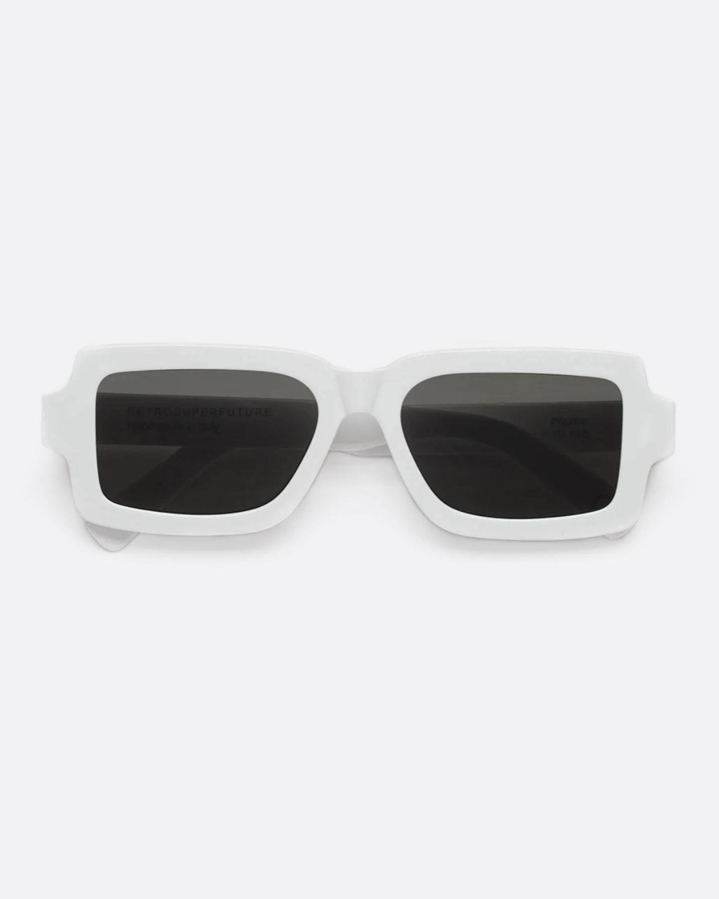 A sharp, contemporary silhouette in solid white acetate.