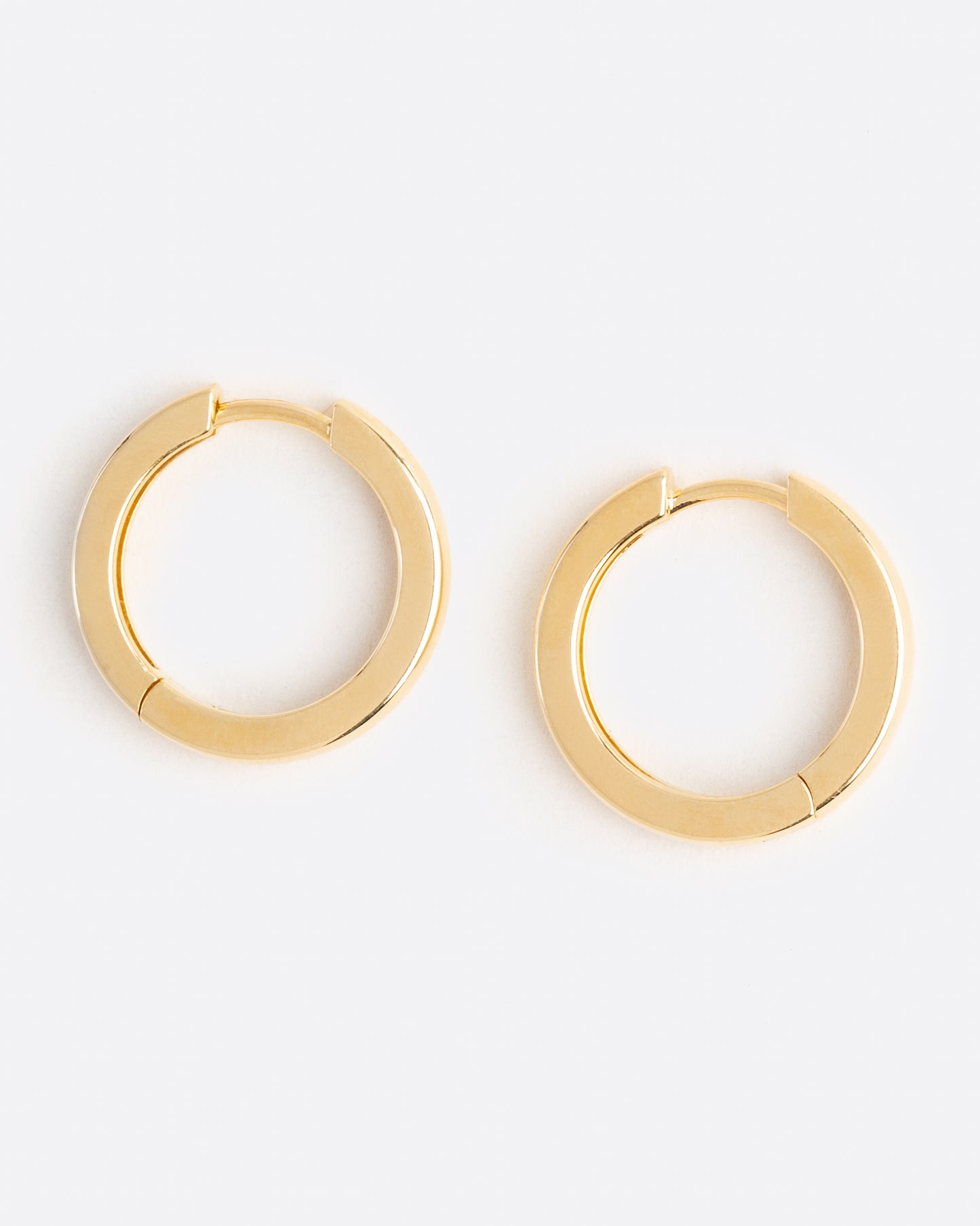 birds eye view of yellow gold hoop earrings