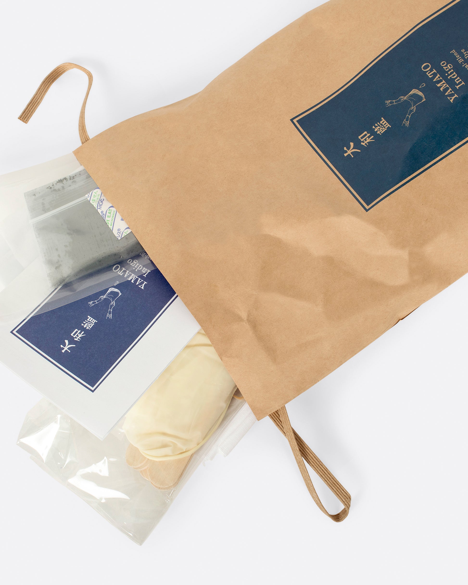 Yamato Indigo shibori dye kit shown open with its contents.