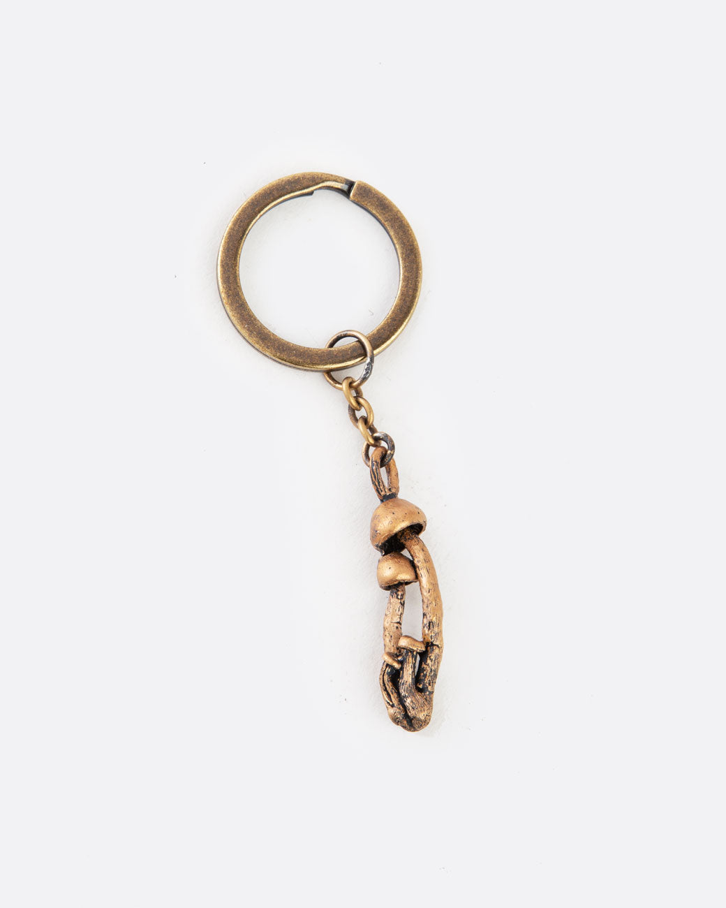 bronze mushroom keychain from above