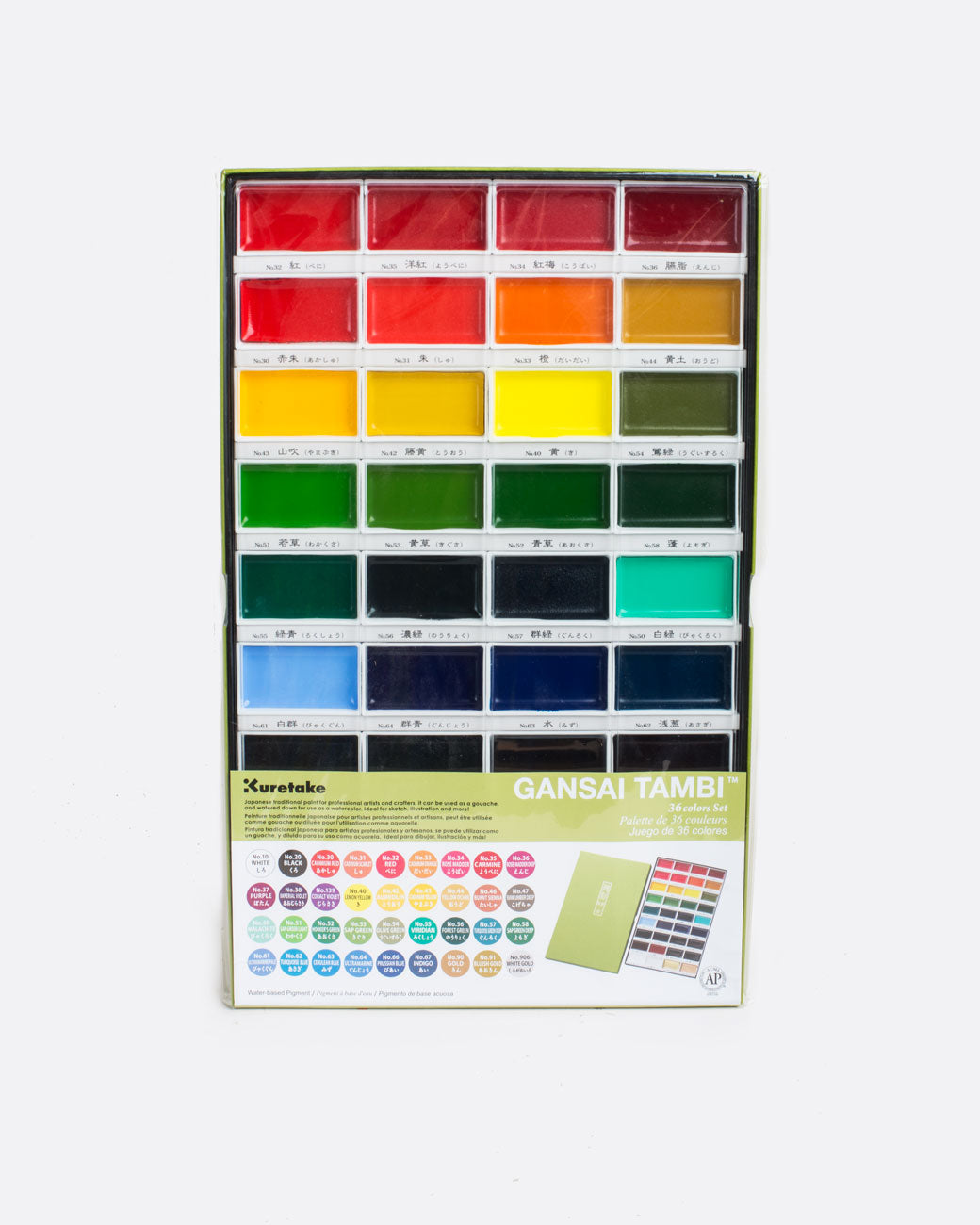 A gansai tambi watercolor set with a grid of  4 columns and 9 rows of watercolor pans. Pictured in packaging with brand notes obscuring most of the last 3 rows. Shown from the front.