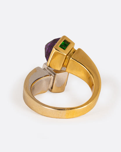 A meld of yellow and white gold, this open wrap ring is tipped with citrine, amethyst, sapphires, and emeralds. The band narrows at the back. Shown from the back.